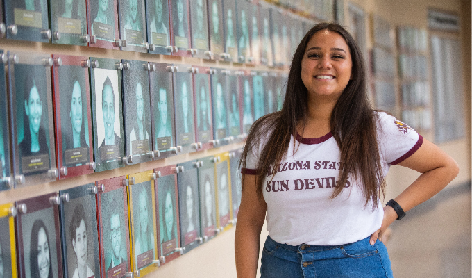 A student in the Pathways for the Future program poses in an ASU shirt.